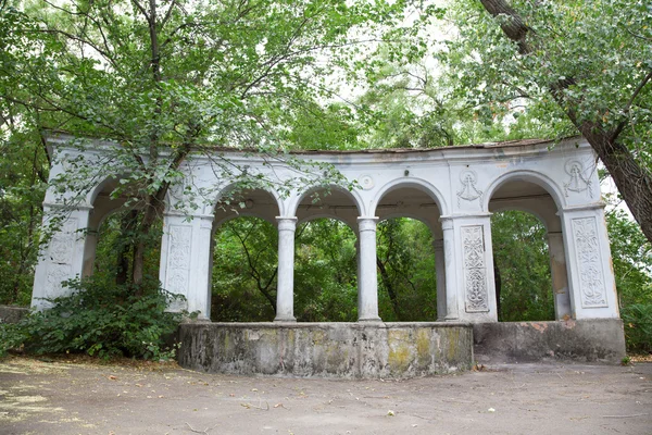 Old arc in green foliage — Stock Photo, Image