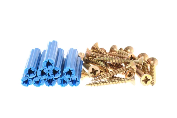Blue dowels and golden screws — Stock Photo, Image