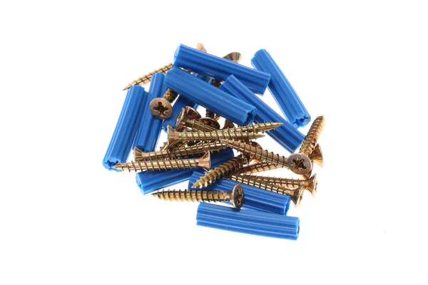 Blue dowels and golden screws — Stock Photo, Image