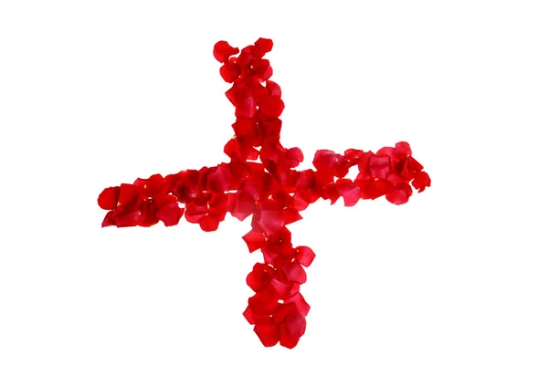 Röda Rosenblad som utgör symboler — Stockfoto