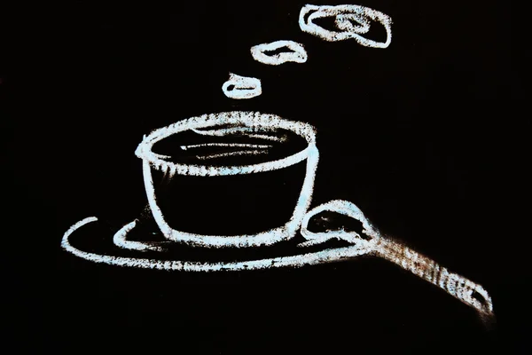 Steaming coffee on a black background — Stock Photo, Image
