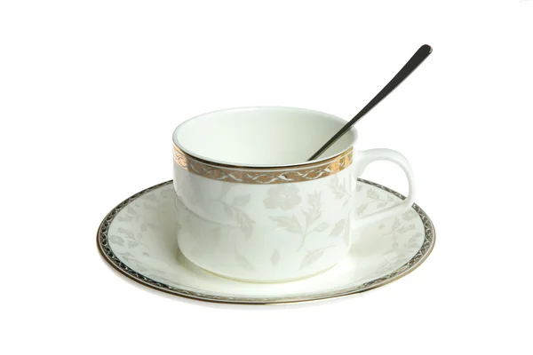 Cup on saucer with spoon — Stock Photo, Image