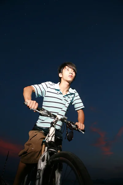 Young asian biker — Stock Photo, Image