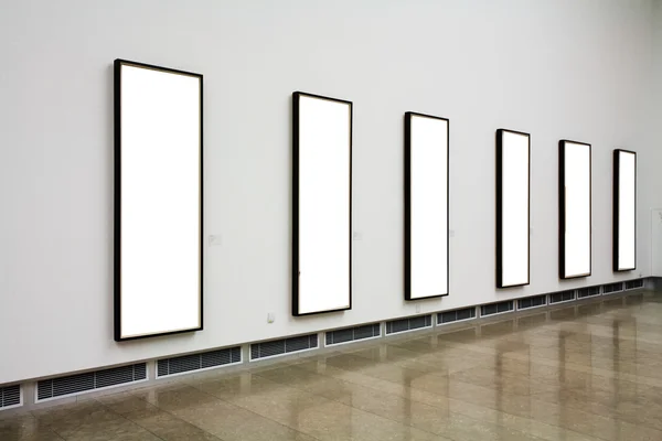 Frames on cement white wall — Stock Photo, Image