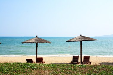 Tente ve sandalye üzerinde plaj, sanya, Çin