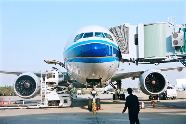 Plane parked at the airport — Stock Photo, Image