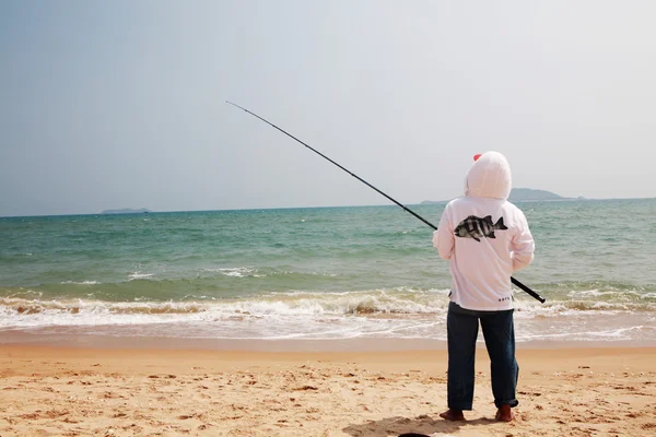 Fishing at the beach — Stock Photo, Image