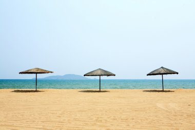 Tente ve sandalye üzerinde plaj, sanya, Çin