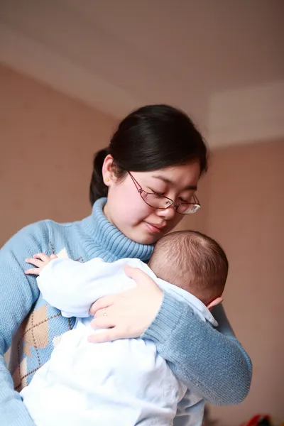 Bebê e sua mãe — Fotografia de Stock