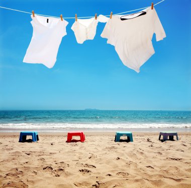 Clothes hanging on the clothesline clipart