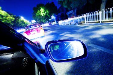 Night traffic,shoot from the window of rush car,motion blur stee clipart