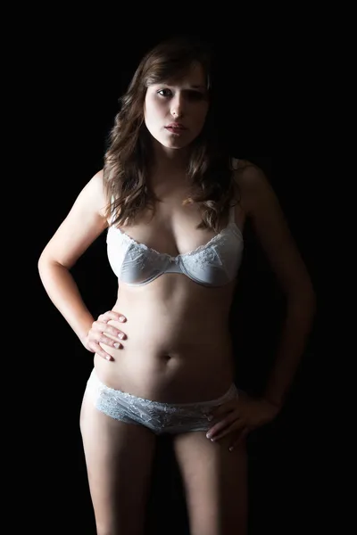 Portrait of a young woman in beautiful white underwear — Stock Photo, Image