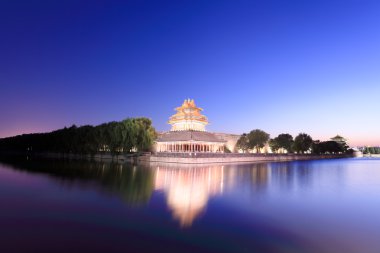 Turret of the forbidden city at dusk clipart