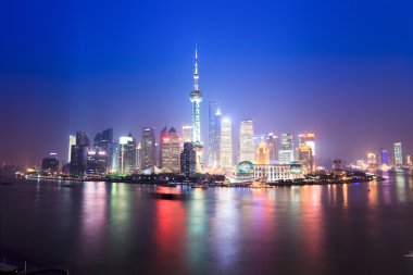 Shanghai skyline at night clipart