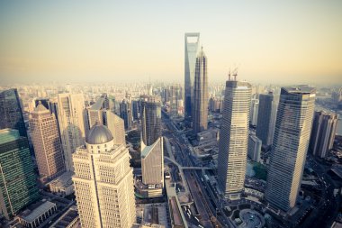 Bird's eye view shanghai financial center at dusk clipart