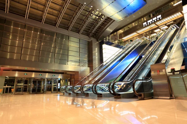 Modern escalators in hall — Stock Photo, Image