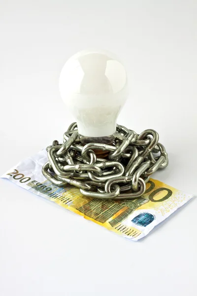 Convecção lâmpada elétrica e dinheiro — Fotografia de Stock