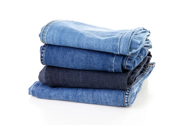 stock image Pile of blue jeans