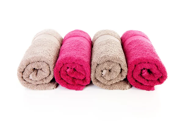 Four rolled colorful towels — Stock Photo, Image