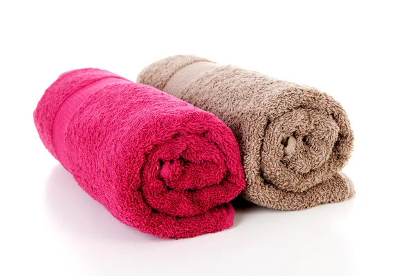Deux serviettes colorées roulées — Photo
