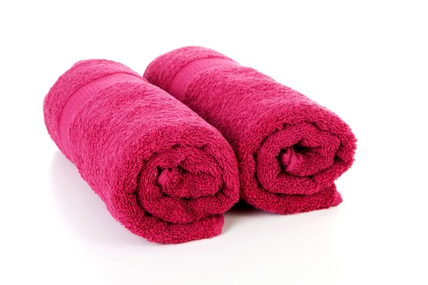 Två rullade färgglada handdukar — Stockfoto