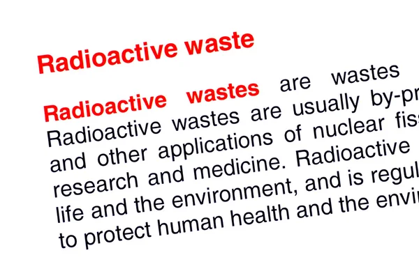 Texto sobre residuos radiactivos resaltado en rojo — Foto de Stock
