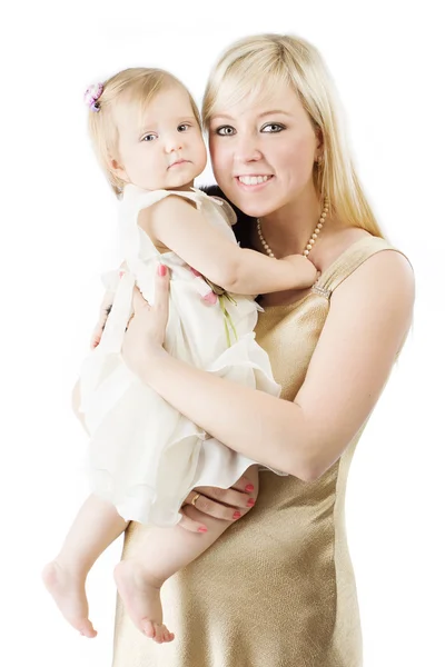 Mãe feliz segurando sorrindo filha de um ano — Fotografia de Stock