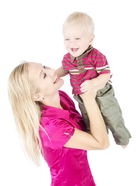 Happy matka s jednoroční dítě pozvedá nad bílá — Stock fotografie