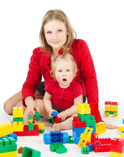 Mother and daughter playing together blocks — Stock Photo, Image