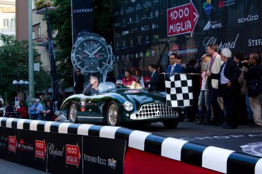 Green 1951 Aston Martin DB3 at the start of 2012 1000 Miglia clipart