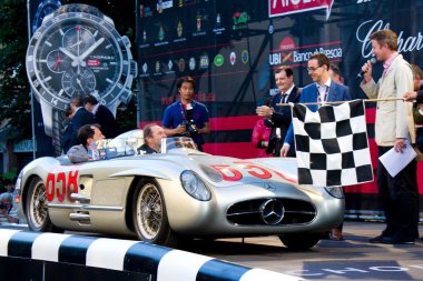 Jochen Mass at the start of 2012 1000 Miglia clipart