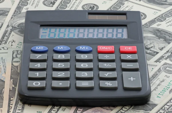 Calculator on dollars — Stock Photo, Image