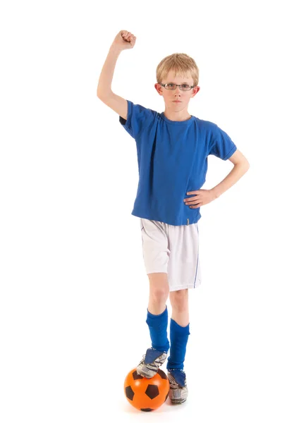 Malý chlapec jako vítězný hráč fotbalu — Stock fotografie