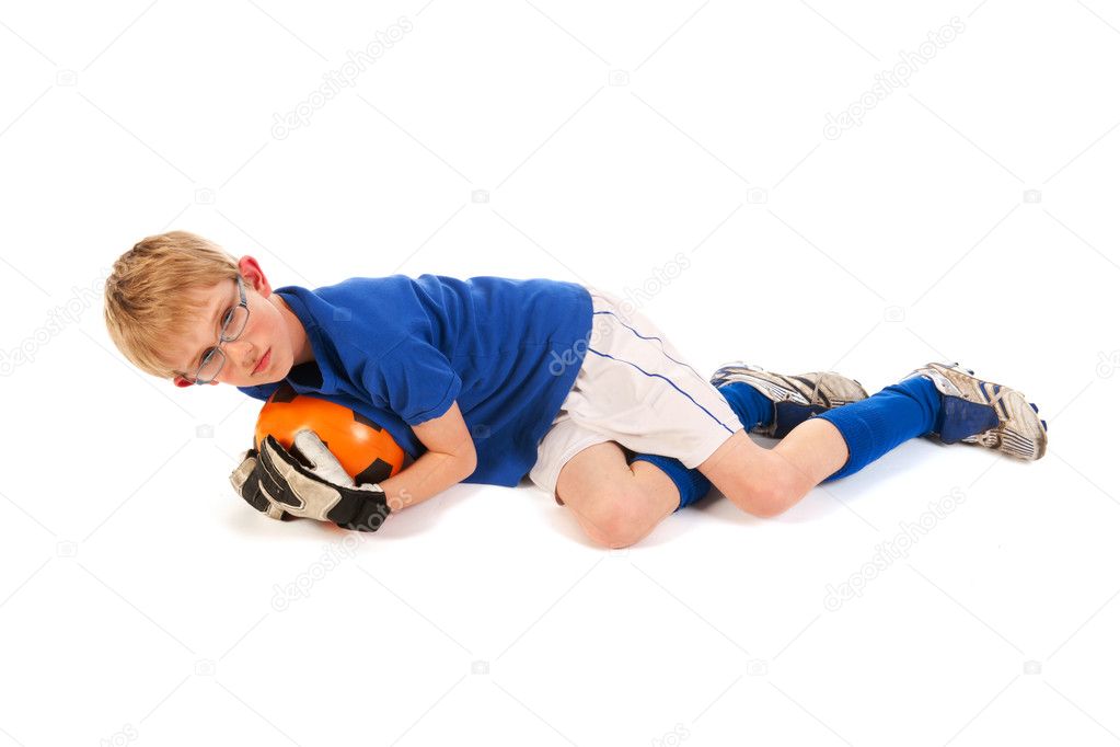 Little boy as soccer keeper