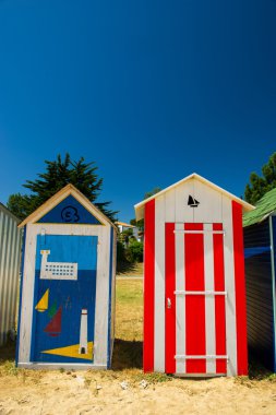 Colorful beach huts clipart