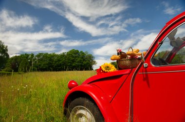 French car with bread and wine clipart