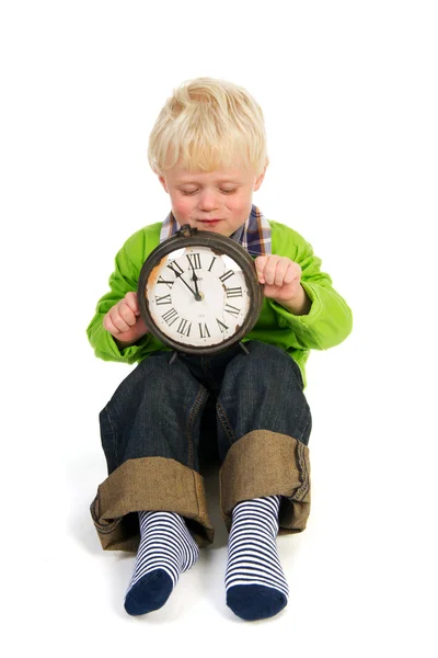 Little child with old clock — Stock Photo, Image