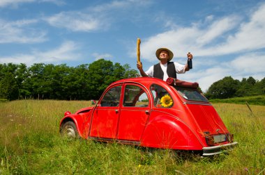 French man with his typical red car clipart