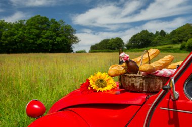 French car with bread and wine clipart