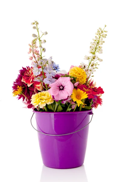 Bucket garden flowers — Stock Photo, Image