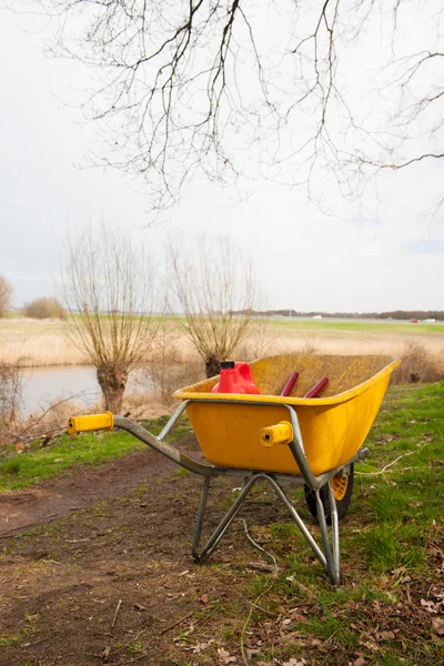 Wheelbarrow in the forest — Stock Photo, Image