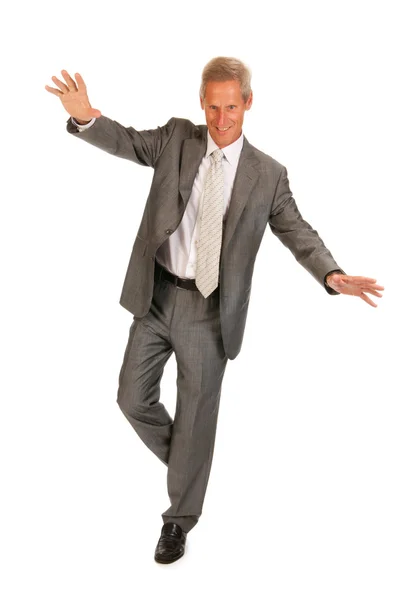 Balancing senior business man — Stock Photo, Image