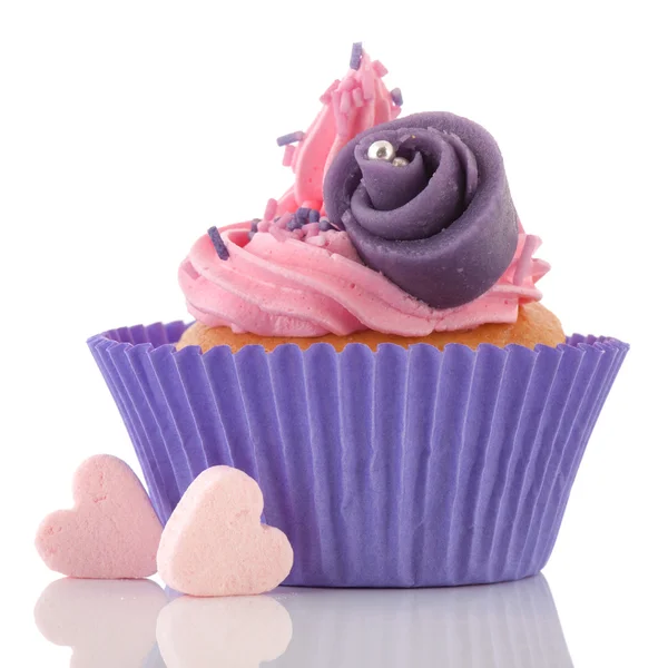 Roze cupcake met botterroom — Stockfoto