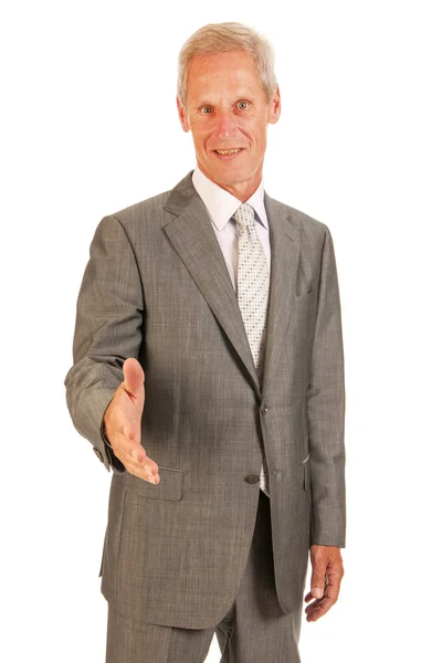 Senior business man giving hand — Stock Photo, Image