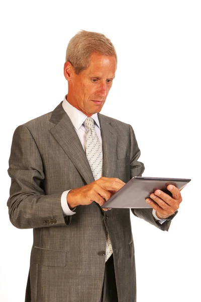 Senior zakenman met Tablet PC — Stockfoto