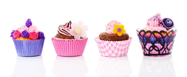 Fila de cupcakes de colores — Foto de Stock