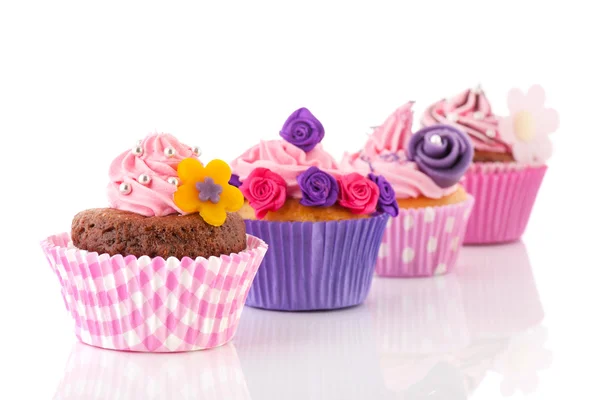 Fila de cupcakes de colores —  Fotos de Stock