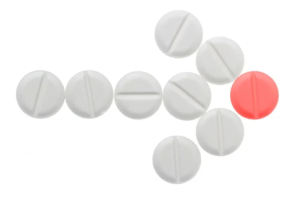Šipka bílých pilulek, které končí na červenou pilulku — Stock fotografie
