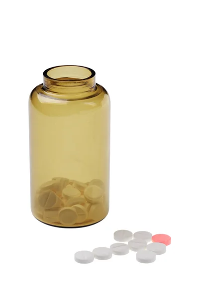 Frasco marrom aberto com seta de pílulas — Fotografia de Stock