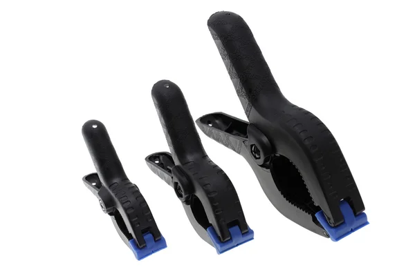Three plastic clamps composition — Stock Photo, Image